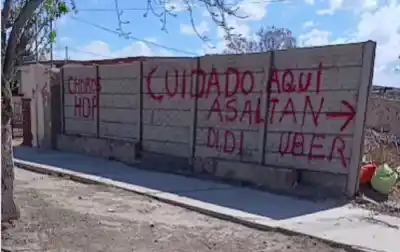 Pintaron una advertencia contra robos en Concepción y los repartidores aprovecharon para sumar reclamos
