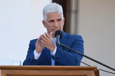 Poggi promulgó la reforma constitucional y anticipó el próximo paso