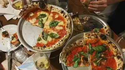 El salario mínimo tucumano hoy compra menos de la mitad de pizzas que hace una década: el revelador índice que muestra la crisis en el bolsillo