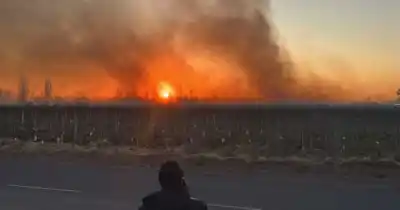 Prendieron fuego para combatir el frío y el humo complicó el amanecer en Mendoza