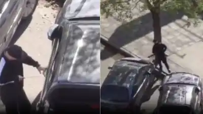 Lo filmaron abriendo una camioneta en pleno centro: nadie esperaba lo que hicieron desde un edificio