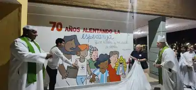 Cáritas cumple 70 años y el primer mural que pintó en el país está en La Banda
