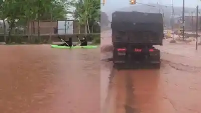 El alerta era para la noche, pero Añelo se inundó al mediodía: autos hundidos y una pareja navegando en kayak