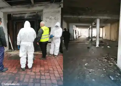 El edificio abandonado de PAMI en el centro: dos camiones de basura y una puerta que ya no se abre