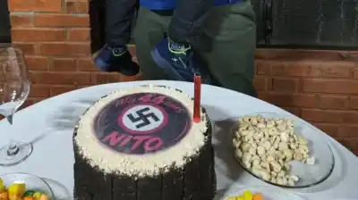 Cumpleaños en Oberá: la torta con una esvástica y el saludo nazi de un nene que desató una investigación judicial