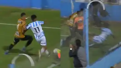 Impactante choque en el ascenso: un futbolista se estrella contra una pared en pleno partido
