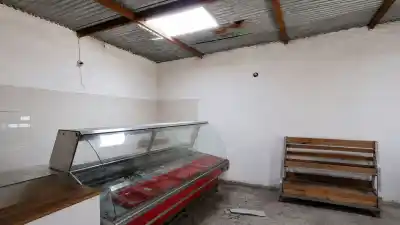 Violentaron el techo de una carnicería en El Carmen y escaparon con un botín millonario
