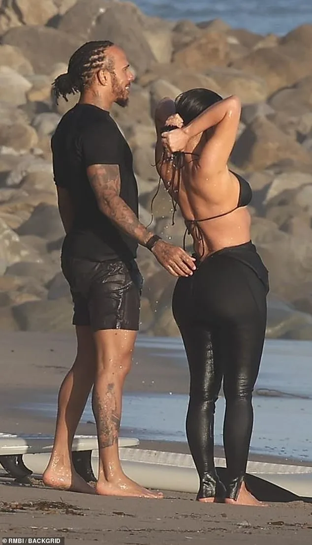 108055157-15753275-She_wore_a_bikini_top_and_a_wet_suit_that_was_pulled_down-m-25_1776805715591.jpg